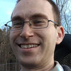 Adam J Koback
